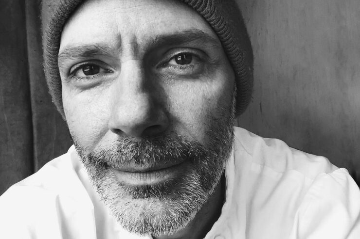 a black and white self portrait of norman jean roy